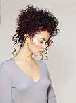 Curls and wringlets set off this hair style