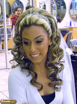 The bride and her bridesmaids all get a great hair style at Raphael International